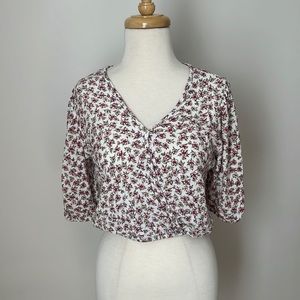 Free Kisses wrap style cropped blouse
